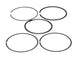Wiseco 99.75mm piston ring set with 1.2, 1.5, and 2.0mm rings for engine pistons, showing the metal rings on a clean surface.