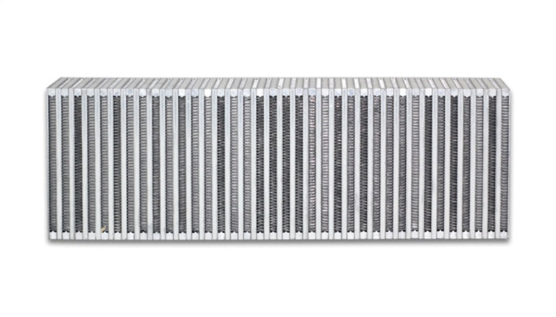 Vibrant vertical flow intercooler core with 24-inch width, 8-inch height, and 3.5-inch thickness showing metal fins and end tanks.