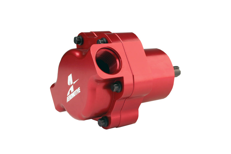 Aeromotive billet belt drive fuel pump installed in a vehicle, showcasing high-performance fuel pump technology.