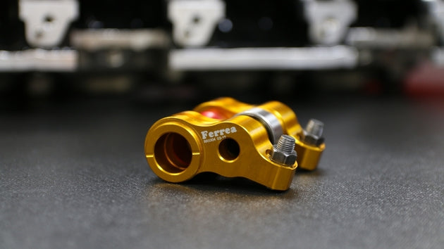 Ferrea Honda K20 roller rocker arms set of 8, high-performance engine components with polished metal finish and detailed parts.