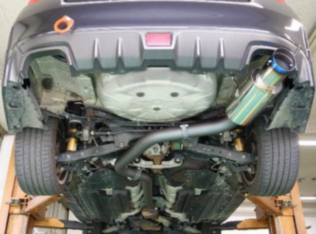 HKS Hi-Power catback muffler for 2015 US Subaru WRX STI, showing the sleek exhaust system and branded muffler component.
