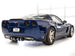 AWE Tuning C6 Chevrolet Corvette Z06/ZR1 touring edition axle-back exhaust with chrome silver tips, mounted on the vehicle.