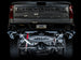 AWE Tuning 4th Gen GM 1500 6.2L catback exhaust with split rear exit and quad chrome tips, featuring bumper cutouts.