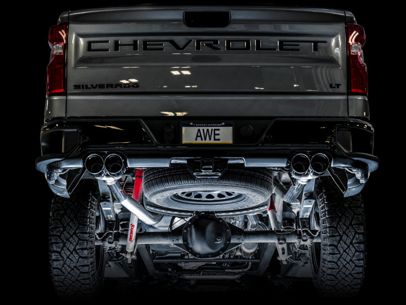AWE Tuning 4th Gen GM 1500 6.2L catback exhaust with split rear exit and quad chrome tips, featuring bumper cutouts.