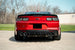 CORSA Performance Corsa 2016-2024 Chevrolet Camaro SS/ZL1 axle-back exhaust with carbon fiber quad tips, showcasing the sleek exhaust tips and piping.