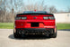 CORSA Performance Corsa 2016-2024 Chevrolet Camaro SS/ZL1 axle-back exhaust with carbon fiber quad tips, showcasing the sleek exhaust tips and piping.