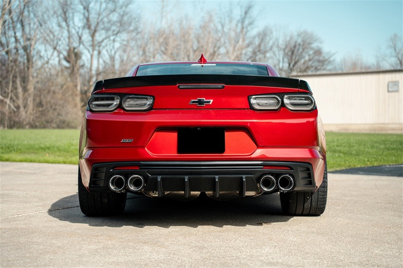 CORSA Performance Corsa 2016-2024 Chevrolet Camaro SS/ZL1 axle-back exhaust with carbon fiber quad tips, showcasing the sleek exhaust tips and piping.
