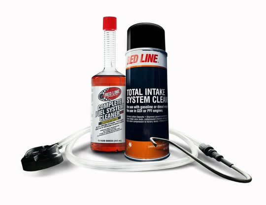 Red Line Complete Fuel System Service Kit with intake cleaner, tank additive, S-hook, and hose for automotive fuel system maintenance.
