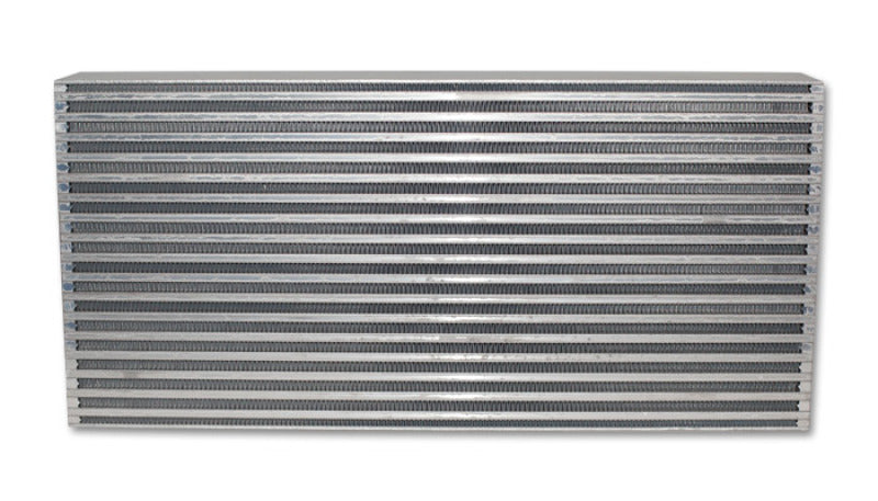 Vibrant air-to-air intercooler core, 25x12x3.5 inches, with aluminum fins and tube design for efficient cooling.