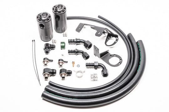 Radium Engineering Dual Catch Can Kit MK5 Supra Oil Catch Can with Fluid Lock system, mounted on engine bay.