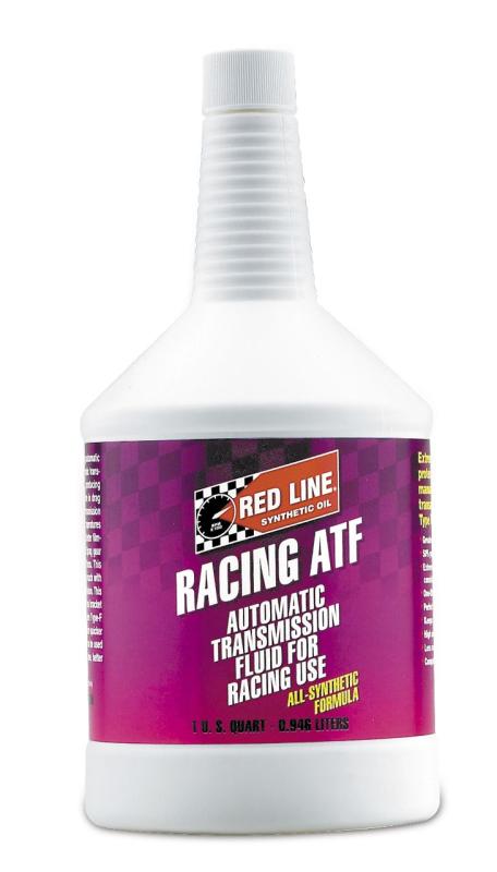 Red Line Racing ATF gear oil quart bottle with red and black label, designed for high-performance transmission lubrication.