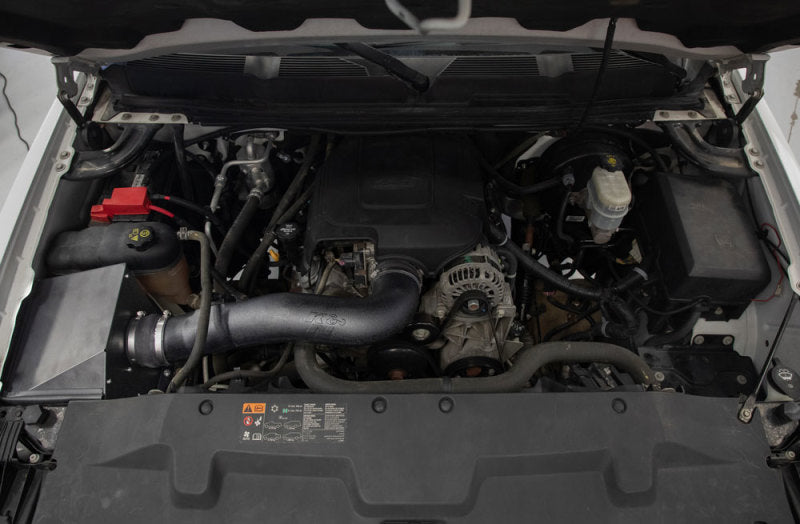 K&N Performance Cold Air Intake System for Chevrolet V8 engines 4.8L to 6.2L, with air filter and intake tubing visible.
