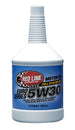 Red Line 5W30 motor oil quart bottle with red label, designed for engine lubrication and performance.