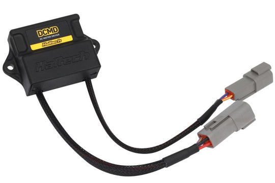 Haltech DC Motor Driver (DCMD) programmer accessory, showing the compact electronic component with connectors and circuit board.
