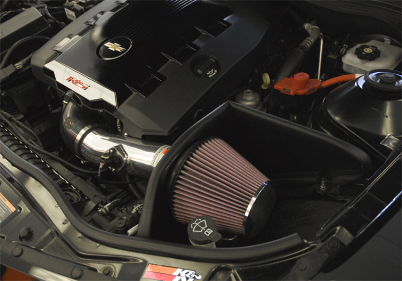K&N Engineering cold air intake for 2010 Chevy Camaro 3.6L V6, showing the black intake tube and filter in engine bay