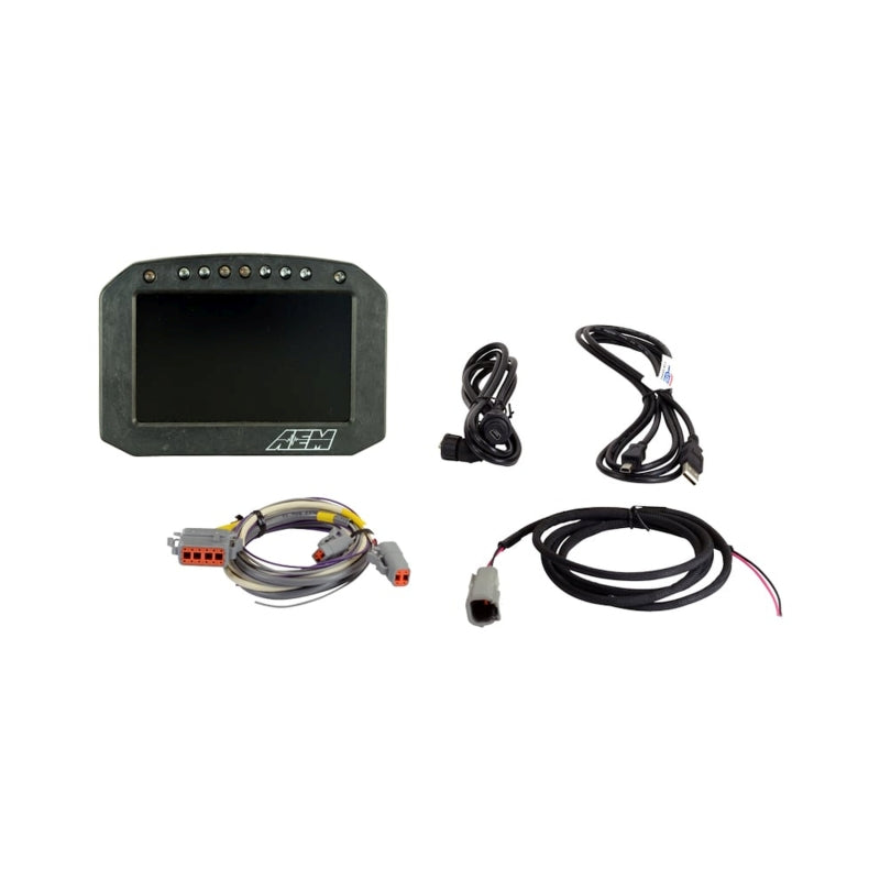 AEM CD-5L Carbon Logging Flush Digital Dash Display gauge showing digital readout and carbon fiber design in a vehicle cockpit.