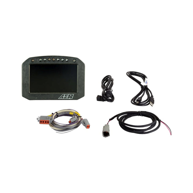 AEM CD-5L Carbon Logging Flush Digital Dash Display gauge showing digital readout and carbon fiber design in a vehicle cockpit.