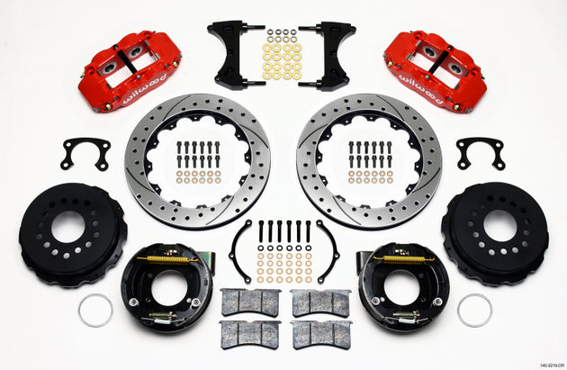 Wilwood Narrow Superlite 4R rear brake kit with red calipers and 12.88-inch drilled rotors for big Ford vehicles.
