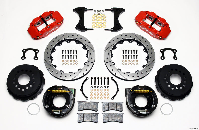 Wilwood Narrow Superlite 4R rear brake kit with red calipers and 12.88-inch drilled rotors for big Ford vehicles.