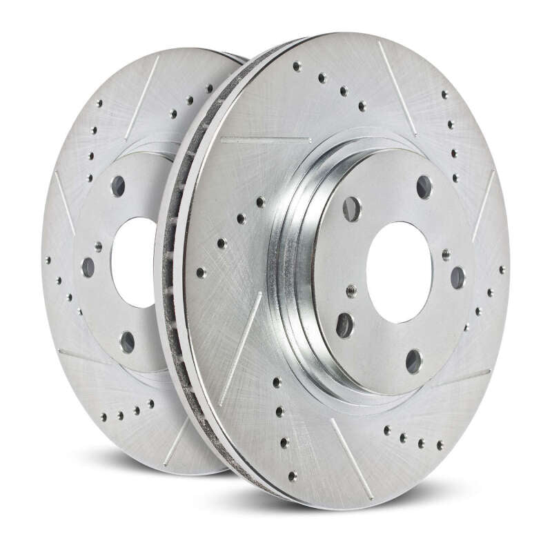Pair of PowerStop drilled and slotted front brake rotors for Ford F-550 Super Duty, showing metal rotors with drilled holes and slots.