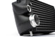 Black AMS Performance intercooler for 2015+ Ford F-150 and Raptor 2.7L/3.5L EcoBoost with AMS logo, showcasing the stock location design.