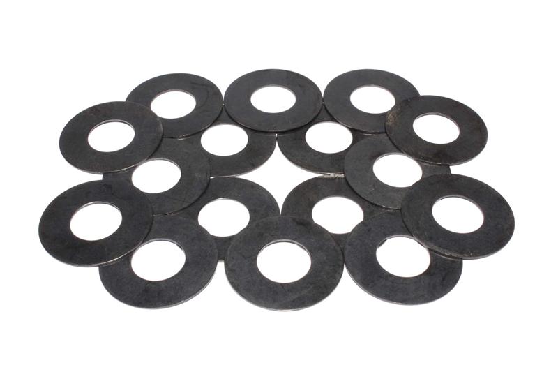 COMP Cams valve spring shims .030 inch thick and 1.437 inches in diameter, shown on a set of valve springs and retainers.