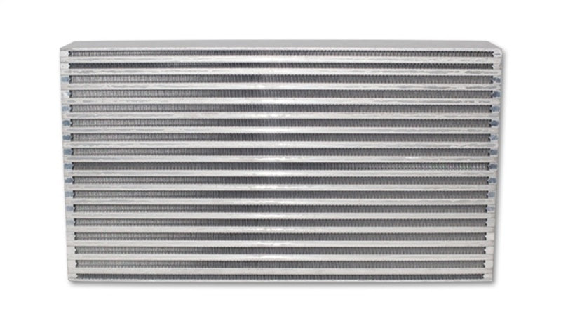 Vibrant intercooler core measuring 20x11x3.5 inches, with bright fins and metal end tanks for high-performance turbocharged engines.