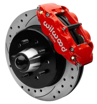 Wilwood Forged Narrow Superlite 6R front big brake kit with 12.19-inch drilled rotors on a 1988-1998 C1500 truck, featuring red calipers.