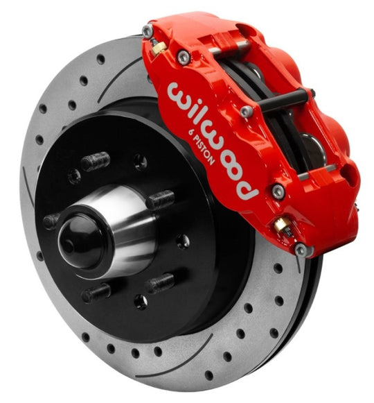 Wilwood Forged Narrow Superlite 6R front big brake kit with 12.19-inch drilled rotors for 1988-1998 C1500 trucks in red.