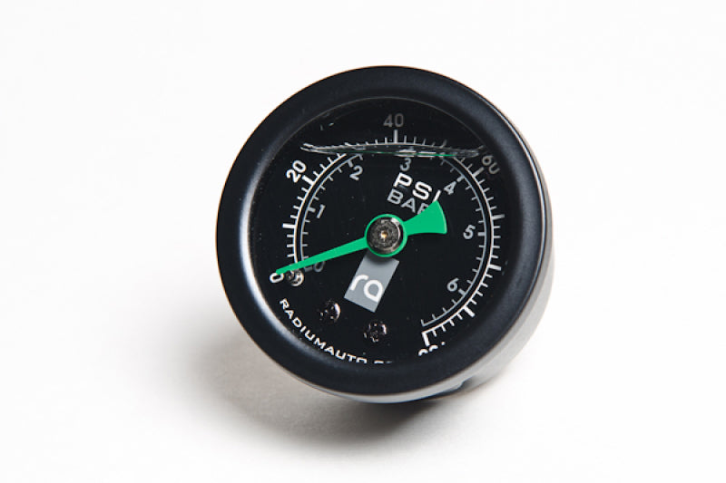 Radium Engineering 0-100 PSI fuel pressure gauge showing a clear dial and needle indicating pressure levels in a vehicle engine system.