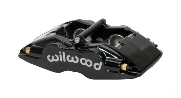 Wilwood forged Superlite brake caliper with 1.38-inch pistons and 1.25-inch disc, finished in black for high-performance braking.
