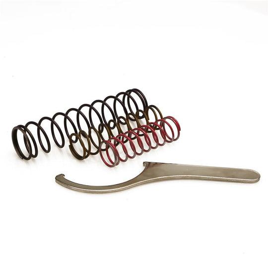 Turbosmart Spring Kit for blow off valve accessories, featuring colorful springs and fitting components for turbocharged engines.