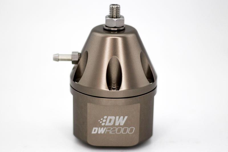 DeatschWerks DWR2000 titanium adjustable fuel pressure regulator with metal fittings and control knob for automotive performance.