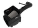 aFe Magnum FORCE Stage-2 Pro Dry S cold air intake system installed in a 2009-2014 Chevrolet Silverado or GMC Yukon engine bay