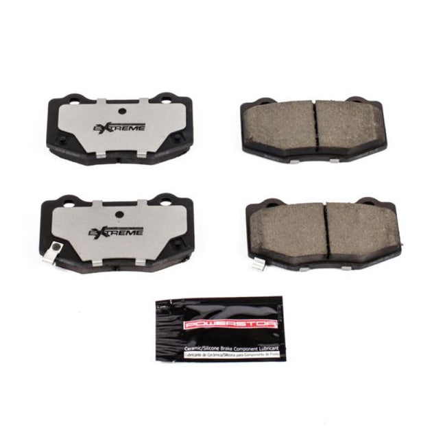 PowerStop Z26 rear performance brake pads with hardware for Cadillac ATS 2016-2019, showing the brake pad set and mounting hardware.