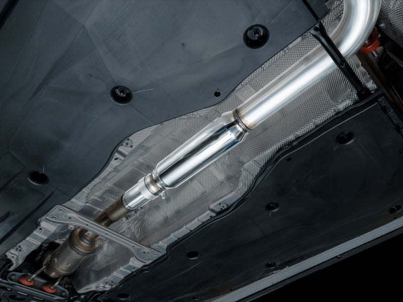 AWE Tuning catback exhaust with diamond black tips installed on a 2022-2025 Volkswagen Jetta GLI Touring Edition.