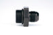 Aeromotive AN-12 O-Ring Boss and AN-10 Male Flare Reducer Fitting showing metal fittings and threading for fuel or oil lines.