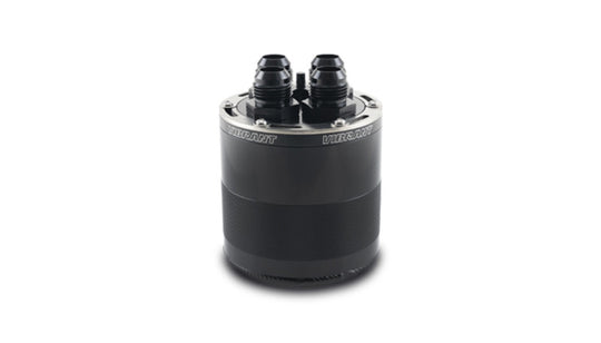 Vibrant small 0.75L 4-port oil catch can assembly showing black metal construction and multiple inlet ports for engine use