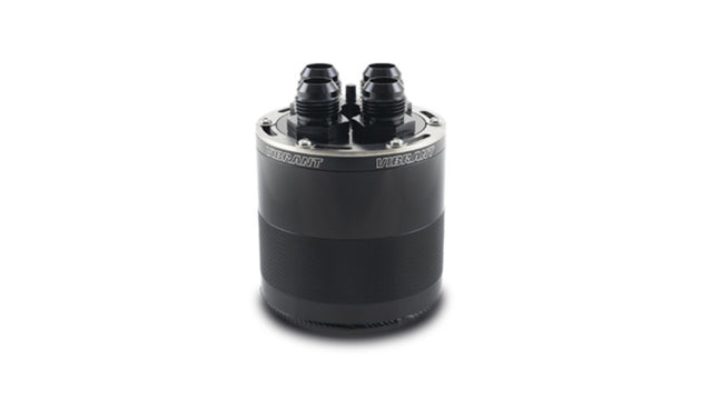 Vibrant small 0.75L 4-port oil catch can assembly showing black metal construction and multiple inlet ports for engine use
