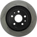 Rear left StopTech Sport slotted brake rotor showing perforated metal surface with slotted design for improved cooling and braking performance.