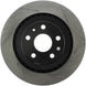 Rear left StopTech Sport slotted brake rotor showing perforated metal surface with slotted design for improved cooling and braking performance.