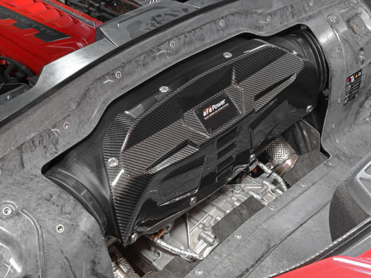 aFe black carbon fiber cold air intake system with Pro DRY S filters installed in a 2020 Corvette C8 engine bay