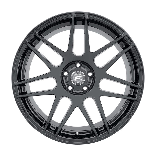 Forgestar F14 18x12 cast wheel in gloss black with 5x120.65 bolt pattern, ET50 offset, and 8.5-inch backspacing.