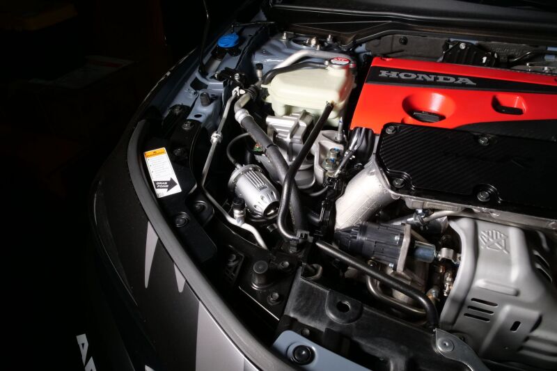 HKS Super SQV4 Blow Off Valve installed on a FL5 vehicle engine for enhanced turbo sound and performance.