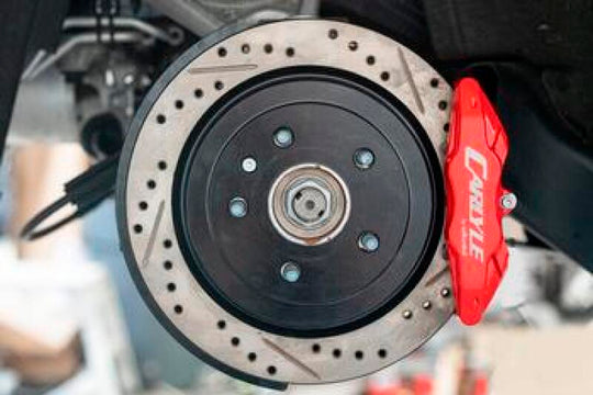 BMR Chevrolet Corvette brake kit with red calipers, 15-inch drilled and slotted rotors for performance brake upgrade.
