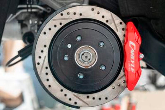 BMR Chevrolet Corvette brake kit with red calipers, 15-inch drilled and slotted rotors for performance brake upgrade.