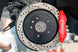BMR Chevrolet Corvette brake kit with red calipers, 15-inch drilled and slotted rotors for performance brake upgrade.