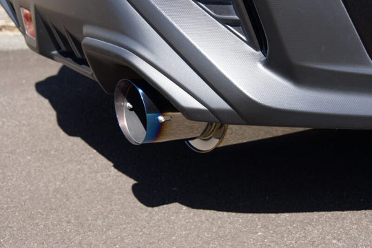 HKS Hi-Power Muffler VBH FA24 catback exhaust system installed on a vehicle, showcasing the sleek stainless steel design.