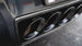 Corsa Performance axle back exhaust for Chevrolet Corvette C7 2014-2019 with dual NPP valves and quad black tips, showing the exhaust tips.