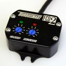 Turbosmart FCD-2 electronic boost controller accessory with control knob and wiring for turbocharged vehicles.